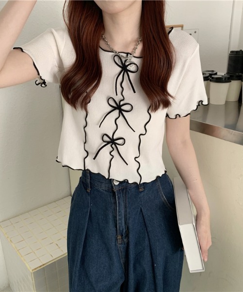 Teem Store(チームストア)の「リボン付きパイピングメロウ サマーニット トップス(ニット/セーター・レディース・イエロー/ホワイト/ピンク/ブラック/ブルー・F)」の1枚目の写真
