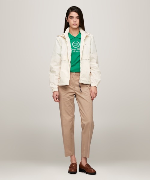 TOMMY HILFIGER(トミーヒルフィガー)の「トランジショナルフーデッドウィンドブレーカー(マウンテンパーカー・レディース・ネイビー/アイボリー・MEDIUM/SMALL/X-SMALL)」の11枚目の写真