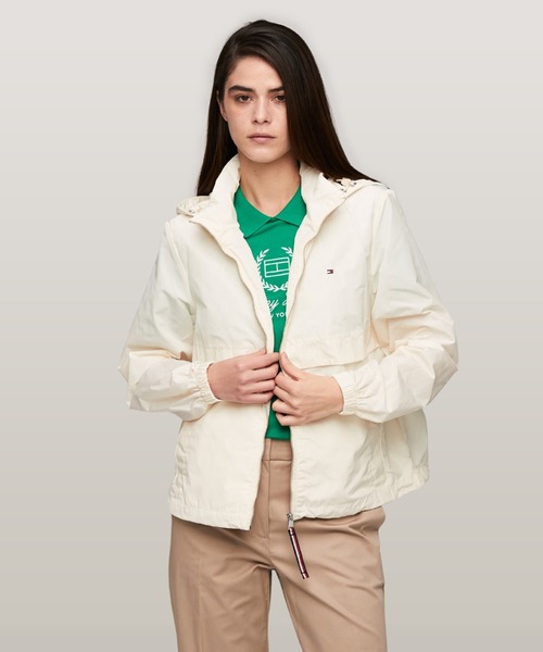 TOMMY HILFIGER(トミーヒルフィガー)の「トランジショナルフーデッドウィンドブレーカー(マウンテンパーカー・レディース・ネイビー/アイボリー・MEDIUM/SMALL/X-SMALL)」の20枚目の写真