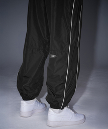 BORN TO WIN（ボーントゥウィン）の「WOVEN PIPING TRACK PANTS [BLACK]（スウェットパンツ）」