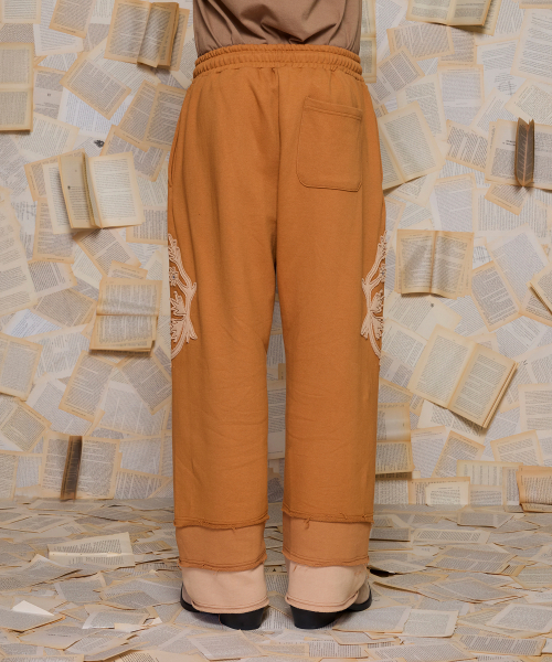 UNALLOYED(アナロイド)の「レイヤードヘムスウェットパンツ / キャメル(スウェットパンツ・メンズ・その他・MEDIUM/LARGE)」の4枚目の写真