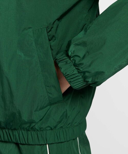 NIKE（ナイキ）の「ナイキ ウィンドランナー ウィメンズ ルーズ UV ウーブン フルジップ ジャケット / Nike Windrunner Women's Loose UV Woven Full-Zip Jacket FV6305-300 Gorge Green（ブルゾン・レディース・グリーン系その他・S/M/L/2XL/XL/XS）」の5枚目の写真
