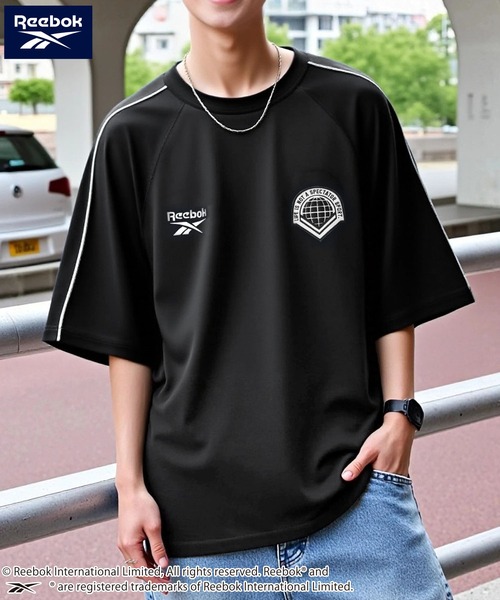 Reebok(リーボック)の「【EC別注】Reebok リーボック ブランド ロゴ ワンポイント 刺繍 ラグラン 半袖 Tシャツ(Tシャツ/カットソー・メンズ・ブラック/サックスブルー/ホワイト・M/LL/L)」の1枚目の写真