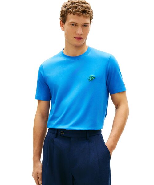 TOMMY HILFIGER(トミーヒルフィガー)の「スクリプトモノグラムスイムショップTシャツ(Tシャツ/カットソー・メンズ・ブルー/オレンジ/ネイビー/ホワイト/グリーン・MEDIUM/LARGE/X-LARGE/SMALL)」の1枚目の写真