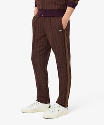 LACOSTE（ラコステ）の「サイドテーピングモノグラムジャカードトラックパンツ（スウェットパンツ）」