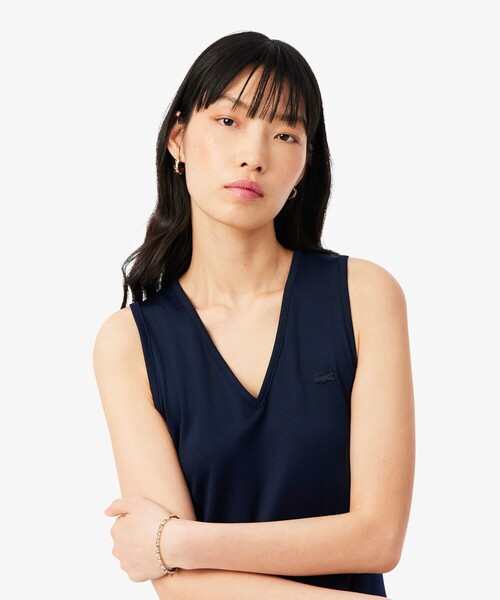 LACOSTE(ラコステ)の「スリーブレスプリーツロングドレス(ワンピース・レディース・オフホワイト/ネイビー・38/40/36)」の6枚目の写真