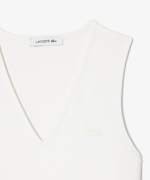 LACOSTE(ラコステ)の「スリーブレスプリーツロングドレス(ワンピース・レディース・オフホワイト/ネイビー・38/40/36)」の4枚目の写真
