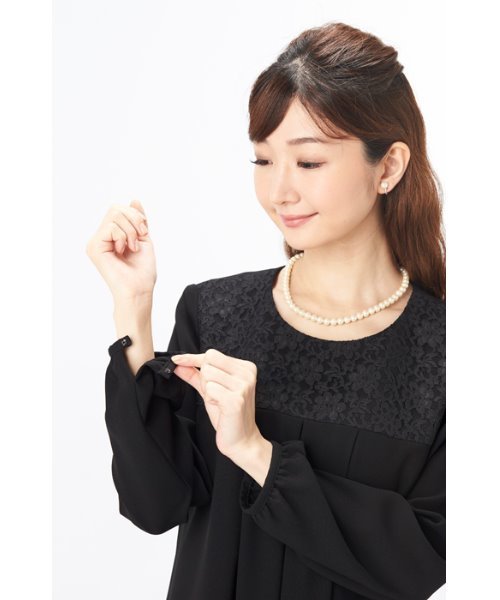 MONOIR(モノワール)の「濃染加工ゆったりサイズワンピース (かぶり仕様)(ワンピース・レディース・ブラック・LL/M/L)」の5枚目の写真