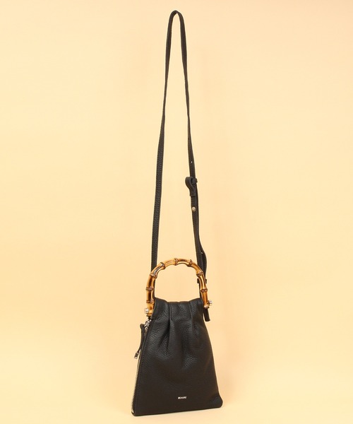 Beau're(ヴュレ)の「BEAURE ヴュレ カウレザー バンブー ハンドル ミニ巾着 ショルダー(ショルダーバッグ・レディース・オレンジ/パープル/ベージュ/ブラック/オリーブ・FREE)」の6枚目の写真