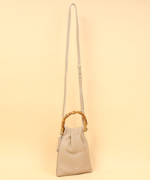 Beau're(ヴュレ)の「BEAURE ヴュレ カウレザー バンブー ハンドル ミニ巾着 ショルダー(ショルダーバッグ・レディース・オレンジ/パープル/ベージュ/ブラック/オリーブ・FREE)」の8枚目の写真