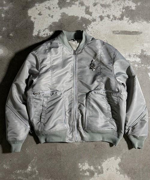 A'GEM/9 × .kom 『A'GEM/9/エージェムナイン』フード着脱MA-1フライト