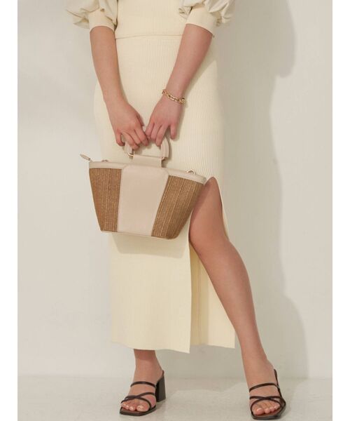 RESEXXY(リゼクシー)の「ディープスリットリブニットスカート【セットアップ着用可能】(スカート・レディース・ブラック/ブルー/ベージュ/アイボリー・FREE)」の1枚目の写真