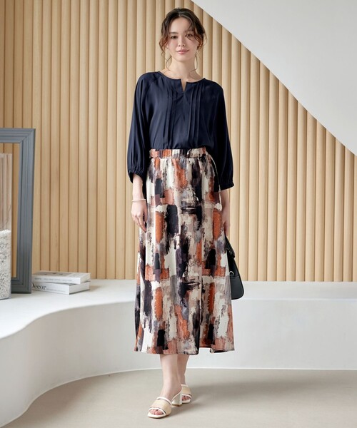 Tiaclasse（ティアクラッセ）の「ペイント柄スカート（スカート・レディース・カーキ/オレンジ・FREE）」の6枚目の写真