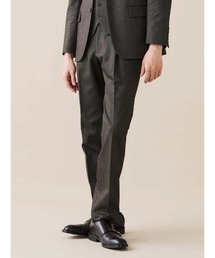 TRANS CONTINENTS（トランスコンチネンツ）の「TRANS CONTINENTS　デレガント　プリントジャージパンツ　ヘリンボン　ブラウン/グリーン（スラックス）」