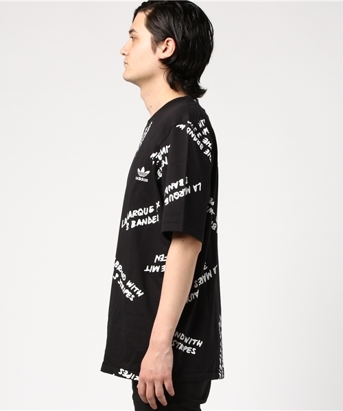 adidas アディダス Tシャツ adidas（アディダス）の「オリジナルス Tシャツ[NYC GRAFFITI TEE]（T