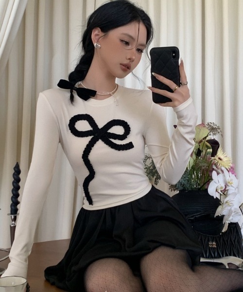 Mejoul(メジュール)の「ラッフルリボンデザイントップス タイトコンパクト ロングスリーブカットソー(Tシャツ/カットソー・レディース・ホワイト/ブラック/グレー・F)」の6枚目の写真