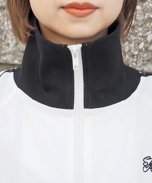 tiptop(ティップトップ)の「ナイロントラックジャケット(ブルゾン・レディース・ネイビー/アイボリー/ブラック/オフホワイト・FREE)」の13枚目の写真