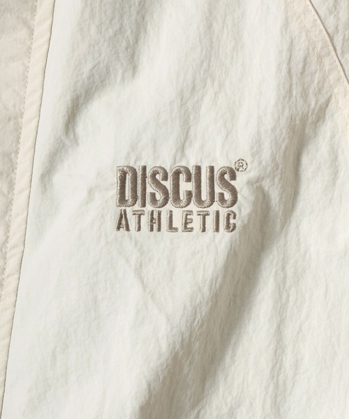 DISCUS(ディスカス)の「DISCUS/ディスカス 裏フリース ワンポイントロゴ刺繍 スタンド ナイロンジャケット レディース メンズ(ナイロンジャケット・メンズ・ネイビー/ベージュ/ブラック/アイボリー・XL/L/M)」の6枚目の写真