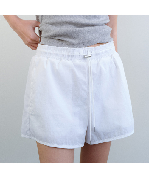 URAGO(ユラーゴ)の「Nylon stopper shorts(その他パンツ・レディース・ネイビー/ホワイト・FREE)」の1枚目の写真