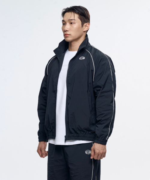 TOLANCE(トランス)の「パイピングトラックスポーティジャケット(ジャージ・メンズ・ブラック・MEDIUM/LARGE/X-LARGE/2XL)」の5枚目の写真
