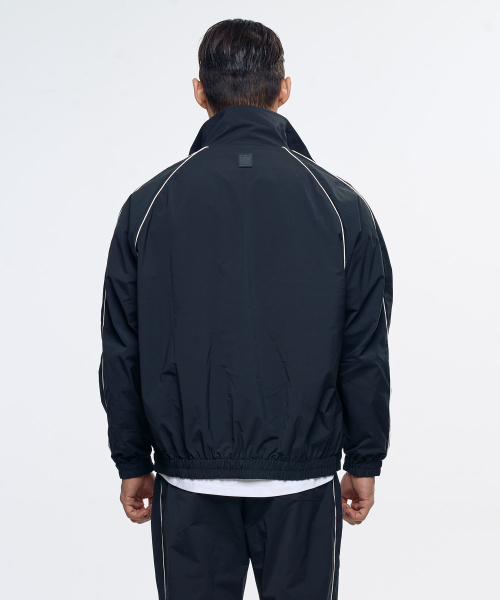 TOLANCE(トランス)の「パイピングトラックスポーティジャケット(ジャージ・メンズ・ブラック・MEDIUM/LARGE/X-LARGE/2XL)」の4枚目の写真