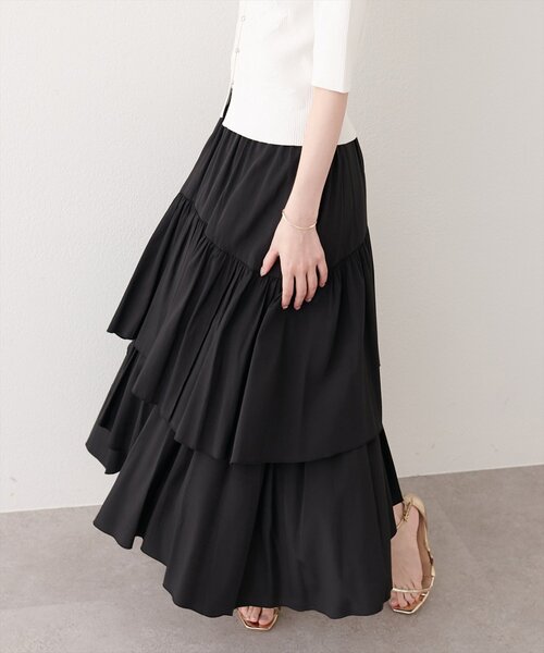 natural couture(ナチュラルクチュール)の「アシメヘム微光沢スカート(スカート・レディース・サックスブルー/ブラック/オフホワイト・FREE)」の1枚目の写真