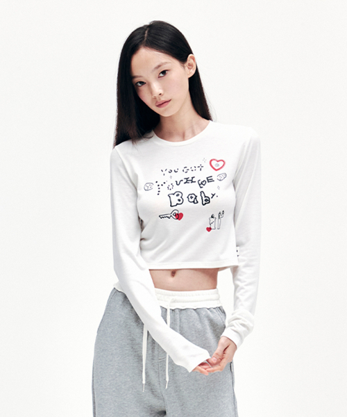 YOUHEE(ユヒ)の「YOUHEE GRAPHIC LONG SLEEVE WHITE(Tシャツ/カットソー・レディース・その他・FREE)」の1枚目の写真