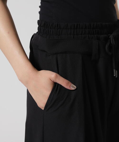 AULA AILA（アウラアイラ）の「AULA AILA/アウラアイラ/別注アシンメトリーカラーパンツ（その他パンツ・レディース・グレー/ブラック・0）」の10枚目の写真