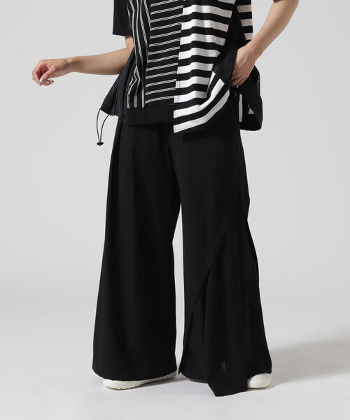 AULA AILA（アウラアイラ）の「AULA AILA/アウラアイラ/別注アシンメトリーカラーパンツ（その他パンツ・レディース・グレー/ブラック・0）」の2枚目の写真