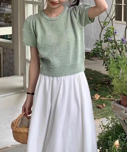 Mejoul（メジュール）の「パステルカラー パフスリーブ パール付き サマーニット（ニット/セーター・レディース・イエロー/ホワイト/ピンク/グリーン/ブラック/ブルー・F）」の3枚目の写真