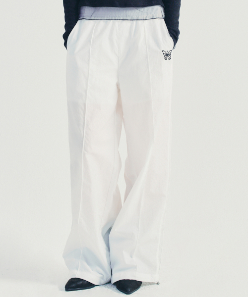 NICK&NICOLE(ニックアンドニコール)の「UTILITY GROOVY TRACKSUIT PANTS_IVORY(スウェットパンツ・レディース・その他・FREE)」の1枚目の写真