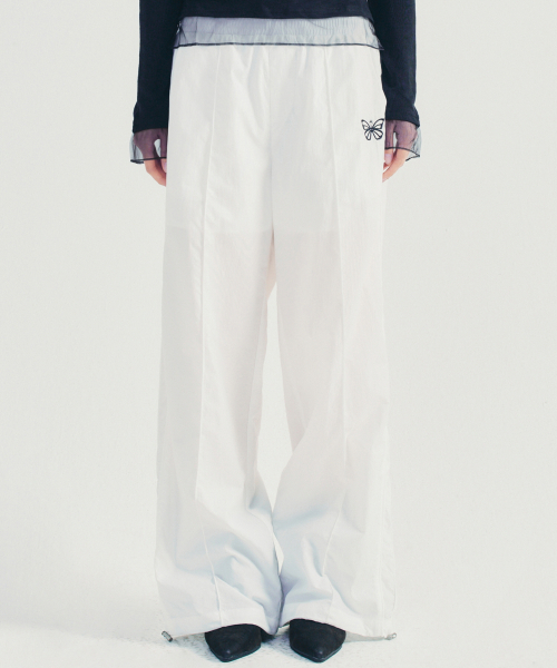 NICK&NICOLE(ニックアンドニコール)の「UTILITY GROOVY TRACKSUIT PANTS_IVORY(スウェットパンツ・レディース・その他・FREE)」の2枚目の写真