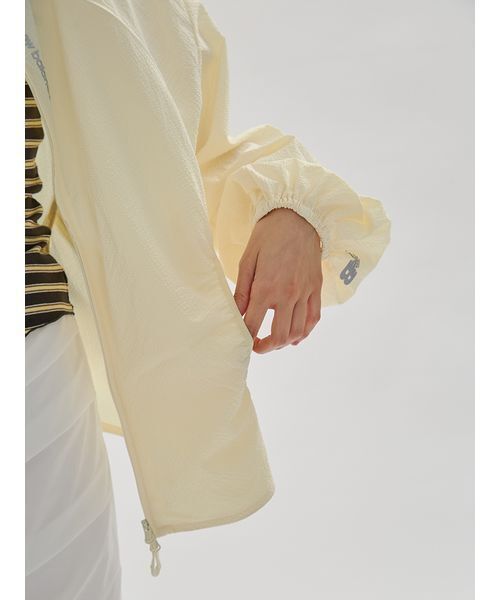 NEW BALANCE（ニューバランス）の「【New Balance for emmi】マルチファンクションジャケット（ナイロンジャケット・レディース・イエロー・M）」の15枚目の写真