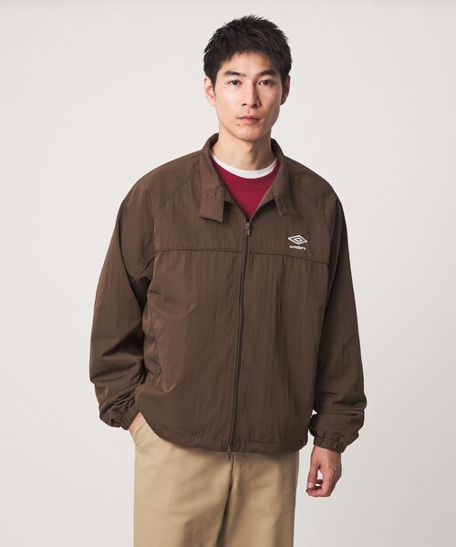 UMBRO(アンブロ)の「【別注】<UMBRO>トラック ジャケット ブルゾン(ブルゾン・メンズ・ブラック/ダークブラウン・L/M)」の7枚目の写真