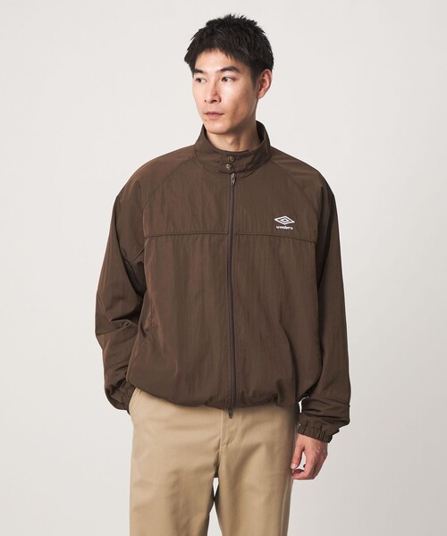 UMBRO(アンブロ)の「【別注】<UMBRO>トラック ジャケット ブルゾン(ブルゾン・メンズ・ブラック/ダークブラウン・L/M)」の8枚目の写真