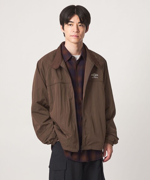 UMBRO(アンブロ)の「【別注】<UMBRO>トラック ジャケット ブルゾン(ブルゾン・メンズ・ブラック/ダークブラウン・L/M)」の9枚目の写真