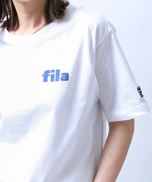 FILA(フィラ)の「【FILA】 ロゴ プリント / 刺繍 レギュラーシルエット ハーフスリーブ 綿100 Tシャツ(Tシャツ/カットソー・レディース・ネイビー系3/サックスブルー系1/ホワイト系5/ブラック系1/グレー系/カーキ系/カーキ系2/ライトグリーン系1/オフホワイト/ライトグリーン/ホワイト×ブルー/ブラック×ホワイト/ホワイト系2/サックスブルー系/ホワイト系4/ブラック系3/グレー系2/ライトグリーン系/ピンク/ホワイト×レッド/ホワイト系1/ネイビー系2/ネイビー系4/ピンク系/ブラック系/ブラック系2/グレー系1/カーキ系1/カーキ系3/ネイビー系/サックスブルー/ブルーグレー/ホワイト×ブラック/ホワイト系/ホワイト系3/ネイビー系1/ホワイト系その他/ホワイト系その他3/ホワイト系6/ブラック系4/カーキ系4/ホワイト系その他4/ホワイト×ネイビー/ピンク系1/ホワイト系7/ホワイト系8/ホワイト系9/サックスブルー系2/ピンク系2/サックスブルー系3/ピンク系3/ネイビー系5/ホワイト系その他5/ホワイト系その他6/ブラック系5/ブラック系6/ネイビー系6/ホワイト系その他2/Off White/ネイビー系7/グレー系3/ブラック系7/ホワイト系その他7・X-LARGE/LARGE/MEDIUM)」の21枚目の写真