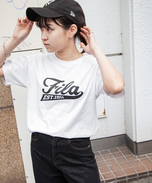 FILA(フィラ)の「【FILA】 ロゴ プリント / 刺繍 レギュラーシルエット ハーフスリーブ 綿100 Tシャツ(Tシャツ/カットソー・レディース・ネイビー系3/サックスブルー系1/ホワイト系5/ブラック系1/グレー系/カーキ系/カーキ系2/ライトグリーン系1/オフホワイト/ライトグリーン/ホワイト×ブルー/ブラック×ホワイト/ホワイト系2/サックスブルー系/ホワイト系4/ブラック系3/グレー系2/ライトグリーン系/ピンク/ホワイト×レッド/ホワイト系1/ネイビー系2/ネイビー系4/ピンク系/ブラック系/ブラック系2/グレー系1/カーキ系1/カーキ系3/ネイビー系/サックスブルー/ブルーグレー/ホワイト×ブラック/ホワイト系/ホワイト系3/ネイビー系1/ホワイト系その他/ホワイト系その他3/ホワイト系6/ブラック系4/カーキ系4/ホワイト系その他4/ホワイト×ネイビー/ピンク系1/ホワイト系7/ホワイト系8/ホワイト系9/サックスブルー系2/ピンク系2/サックスブルー系3/ピンク系3/ネイビー系5/ホワイト系その他5/ホワイト系その他6/ブラック系5/ブラック系6/ネイビー系6/ホワイト系その他2/Off White/ネイビー系7/グレー系3/ブラック系7/ホワイト系その他7・X-LARGE/LARGE/MEDIUM)」の13枚目の写真