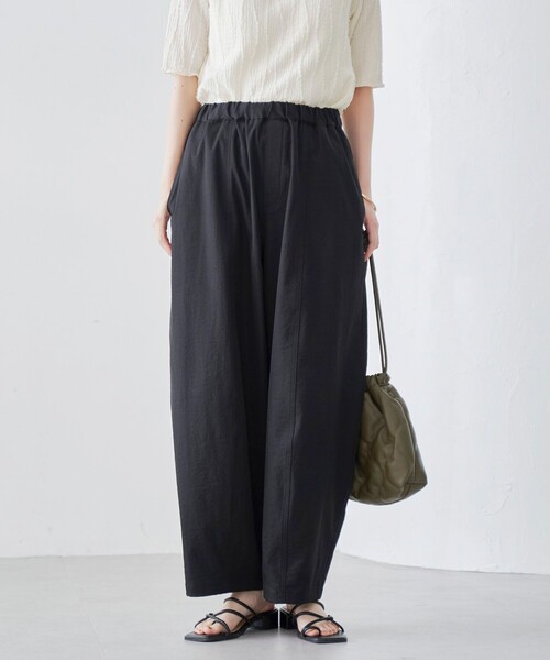 coen（コーエン）の「ポリツイルコクーンパンツ（スラックス・レディース・ダークグレー/ナチュラル/ブラック/ベージュ・M/L）」の2枚目の写真