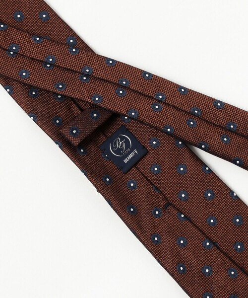 BEAMS F（ビームスエフ）の「シルク フラワー小紋柄 ジャカード ネクタイ（ネクタイ・メンズ・ネイビー/オレンジ・ONE SIZE）」の4枚目の写真