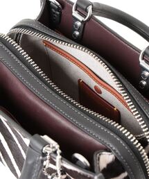 COACH（コーチ）の「ローグ 20・ヘアカーフ・ゼブラ プリント