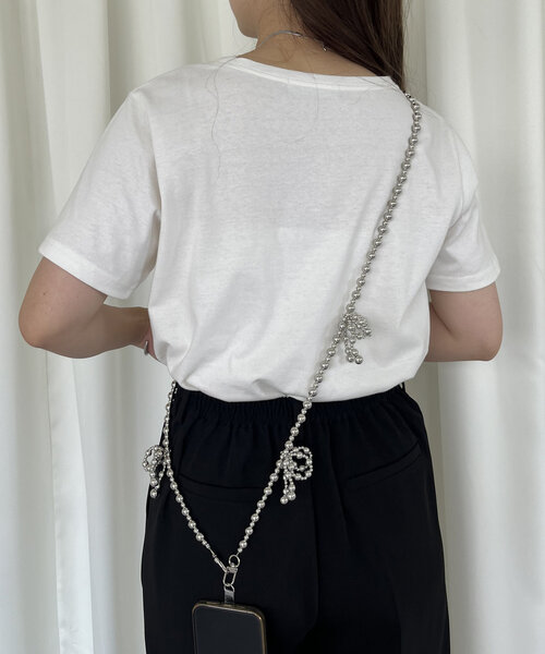 prose verse(プロズヴェール)の「ビーズリボンスマホストラップ(ブローチ/コサージュ・レディース・シルバー/オフホワイト・フリ-)」の7枚目の写真