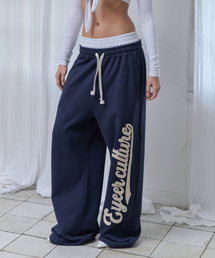 EYEER（イワイイアル）の「Script Logo Layerd Sweatpants - Navy（スウェットパンツ）」