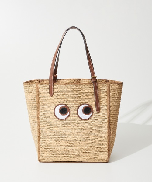ANYA HINDMARCH(アニヤハインドマーチ)の「ANYA HINDMARCH N/S Tote Small Eyes in Raffia アニヤハインドマーチ アイズ トートバッグ(トートバッグ・レディース・ナチュラル・FREE)」の1枚目の写真