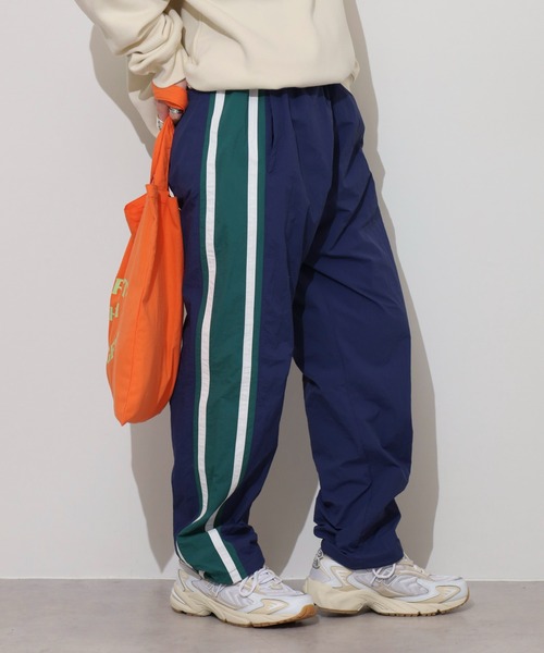 FILA（フィラ）の「FILA Nylon track Jacket ライン ナイロントラックパンツ メッシュ セットアップ可（その他パンツ・メンズ・レッド/ネイビー・L/LL/M）」の3枚目の写真