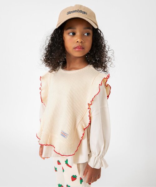 BREEZE(ブリーズ)の「【ジュニア対応】ワッフルベスト(ベスト・キッズ・ブラック/アイボリー・90/100/120/140)」の1枚目の写真