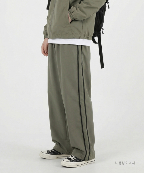 UMM(ウム)の「ツーピンタック配色ラインワイドトレーニングトラックパンツ3COLOR(スウェットパンツ・メンズ・ブラック/チャコール/カーキ・F)」の4枚目の写真