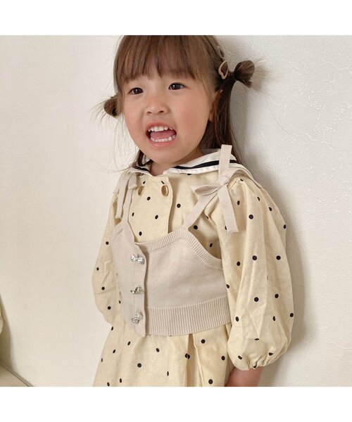 apres les cours(アプレレクール)の「【ジュニア対応】リボンチャームニットビスチェ(ベスト・キッズ・アイボリー/ネイビー・100/120/140)」の6枚目の写真