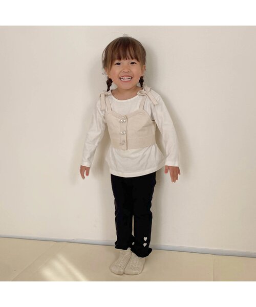 apres les cours(アプレレクール)の「【ジュニア対応】リボンチャームニットビスチェ(ベスト・キッズ・アイボリー/ネイビー・100/120/140)」の8枚目の写真