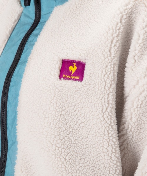 le coq sportif（ルコックスポルティフ）の「【池田エライザコラボ】ドッキングボアフリースアノラック レディース ウェア シェルジャケット コート スポーツウェア（ブルゾン・レディース・ホワイト/パープル・XL/L/M）」の21枚目の写真